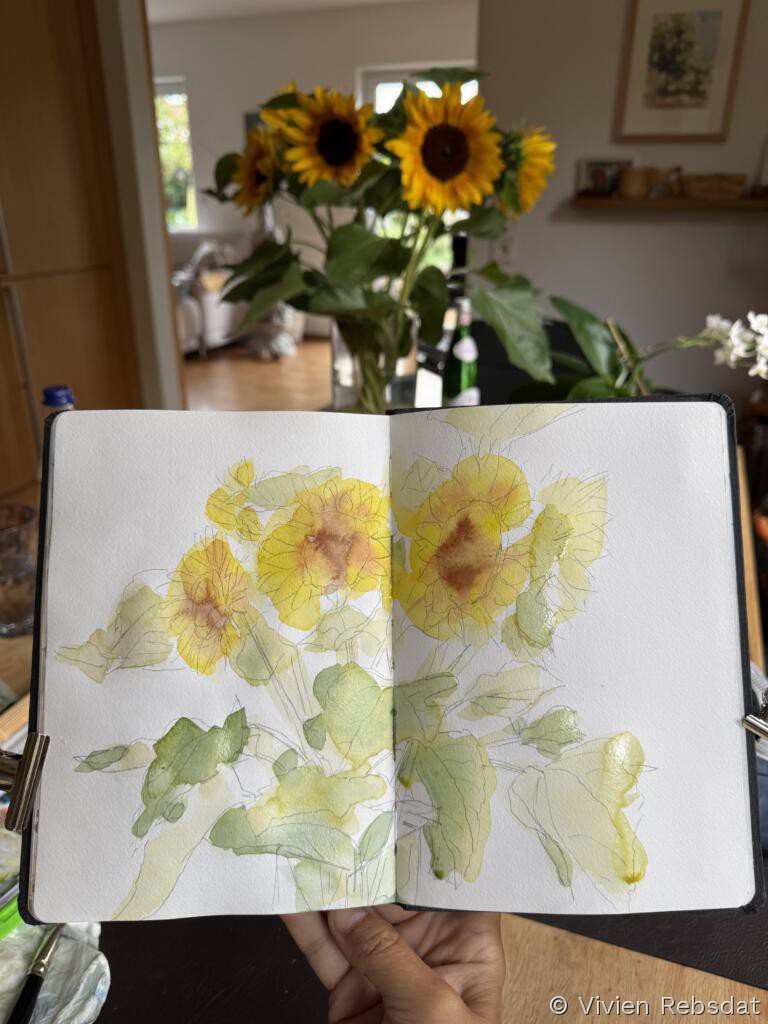 Sonnenblumenstrauß in Aquarell im Skizzenbuch - erster Was